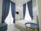 Трёхместный номер Стандарт с балконом