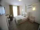 Трёхместный номер Стандарт с балконом