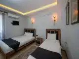 Трёхместный номер Deluxe