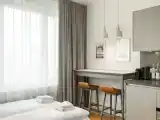 Apartment Suite with a living area with loggia