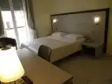 Трёхместный номер Стандарт с балконом и с видом на город