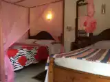 Трёхместный номер Стандарт c 1 комнатой с видом на сад