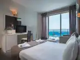 Трёхместный номер Deluxe с видом на море