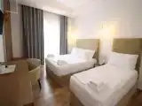 Трёхместный номер Deluxe с балконом