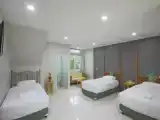 Трёхместный номер Deluxe с балконом