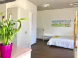 Четырёхместный номер Стандарт с балконом