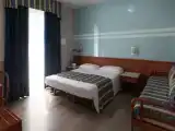 Трёхместный номер Стандарт с балконом