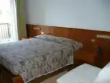 Трёхместный номер Стандарт с балконом