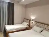 Трёхместный номер Deluxe