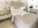 Четырёхместный номер Стандарт с балконом