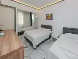 Четырёхместный номер Стандарт с балконом