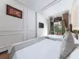 Четырёхместный семейный номер Стандарт с балконом и с видом на город