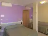 Трёхместный номер Стандарт с балконом