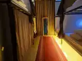 Кровать в общем номере (женский номер) с видом на город