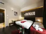 Трёхместный номер Deluxe