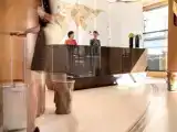 Кровать в общем номере Мансарда