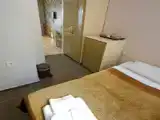 Трёхместный номер Стандарт с балконом и с видом на сад