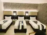 Трёхместный номер Deluxe