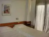 Трёхместный номер Стандарт с балконом