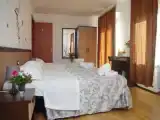 Четырёхместный номер Стандарт с балконом