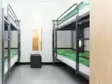 Кровать в общем номере