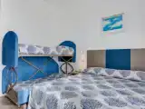 Четырёхместный номер Стандарт с частичным видом на море