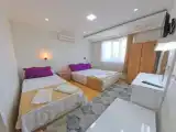 Трёхместный номер Стандарт с балконом