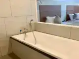 Трёхместный номер Deluxe