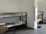 Кровать в общем номере (женский номер) с балконом