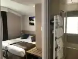 Трёхместный номер с видом на патио