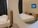 Трёхместный люкс Deluxe с видом на море
