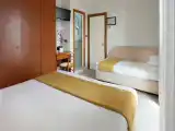 Трёхместный номер Deluxe
