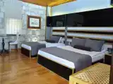 Трёхместный номер Deluxe