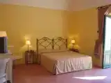 Четырёхместный номер Стандарт с балконом