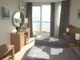 Трёхместный номер Стандарт с балконом