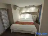 Кровать в общем номере Дуплекс