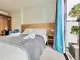 Трёхместный номер Стандарт с балконом