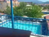 Студия с видом на бассейн