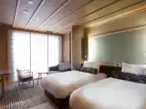 Трёхместный номер Deluxe