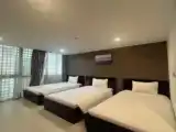 Трёхместный номер Deluxe