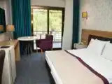 Трёхместный номер Стандарт с балконом