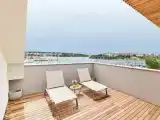 Четырёхместный люкс с балконом и с видом на море