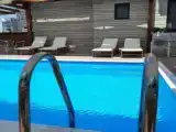 Четырёхместный номер Стандарт Цокольный этаж с балконом