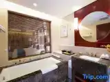 Трёхместный номер Deluxe
