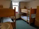 Кровать в общем номере (мужской номер)