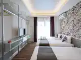 Трёхместный номер Deluxe с балконом