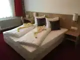 Четырёхместный номер Стандарт с балконом
