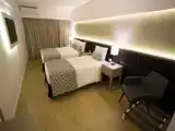 Трёхместный номер Deluxe