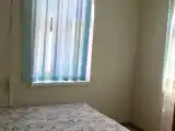 Трехместный номер с общей ванной комнатой