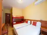 Четырёхместный номер Стандарт с балконом
